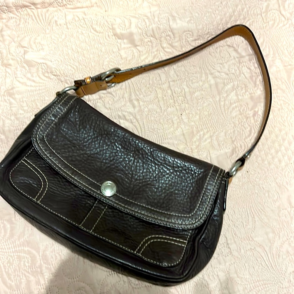 Brown Coach purse.  Used but well taken care of!